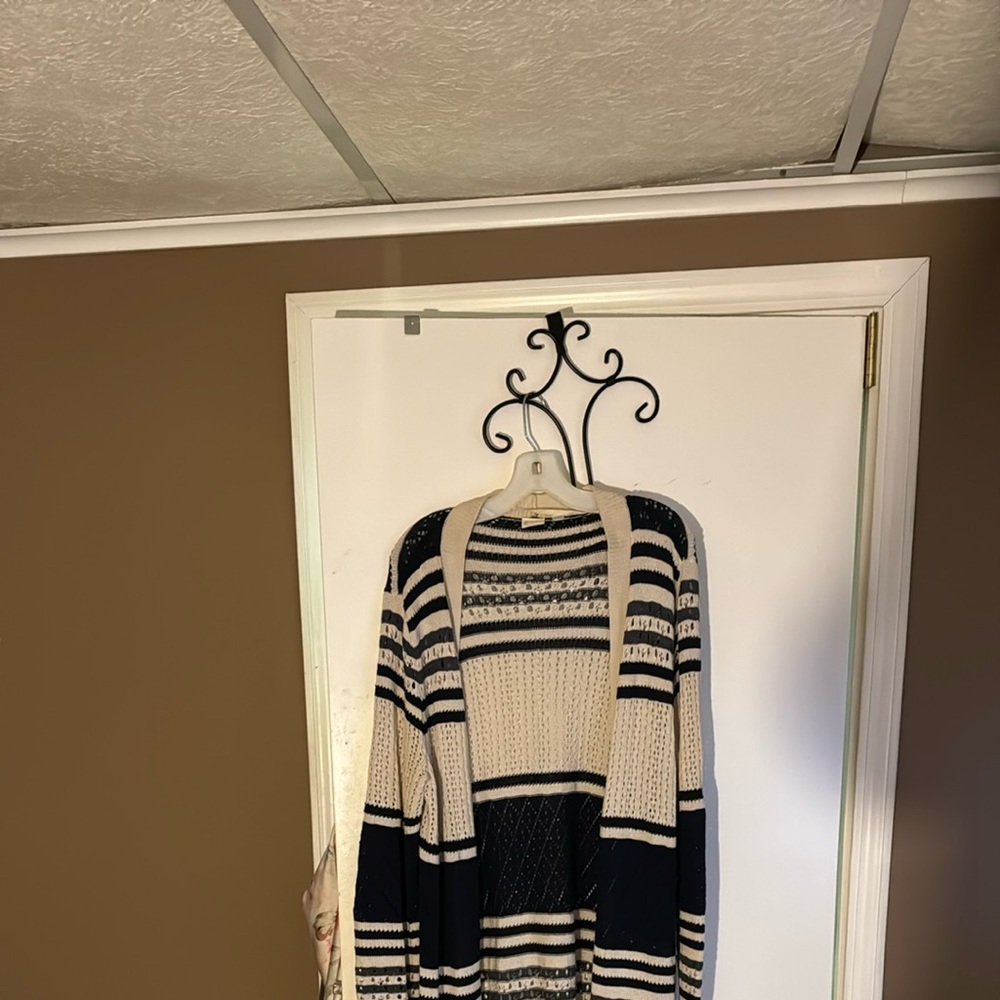 Blue striped long sweater. Looks good with leggings